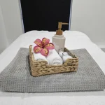 Essential oils, fresh towels, and spa therapy supplies