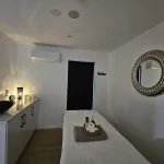 Tranquil private massage treatment room one setup