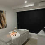 Peaceful massage bed setup in private treatment room two